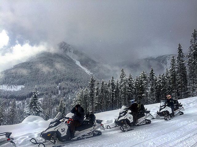 The mystique of the #mountains only increases when the #weather moves in. #tobycreekadventures #snowmobiletours #snowstorm