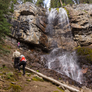 A older family hiking at Marmot Falls at Toby Creek Adventures