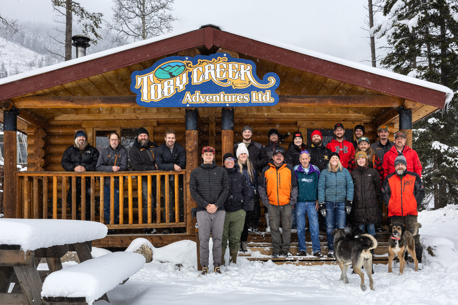 Toby Creek Adv. Staff Photo in front of Guest Check In cabin